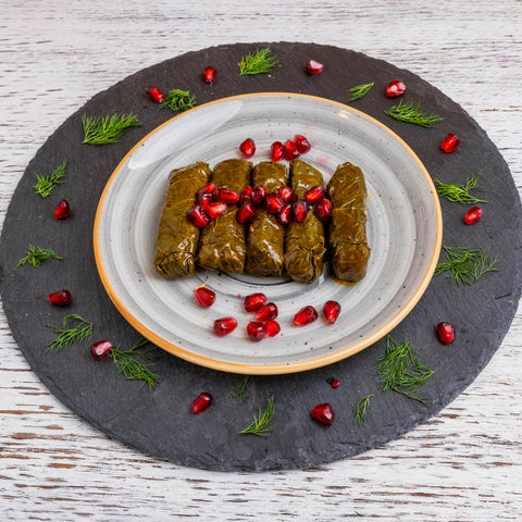 Stuffed Leaves with Pomegranate Sauce